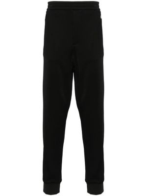 Alexander McQueen pantalon de jogging à logo brodé - Noir