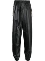 Moschino pantalon de jogging court en cuir - Noir - thumbnail