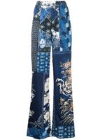 Roberto Cavalli pantalon évasé à imprimés multiple - Bleu