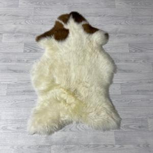 Schapenvacht bruin creme 110x70cm