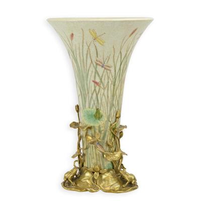 A BRONZE MOUNTED PORCELAIN VASE