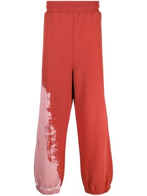 A-COLD-WALL* pantalon de jogging à motif tie-dye - Rouge
