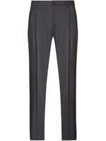 Dolce & Gabbana pantalon fuselé en laine à détails de plis - Gris