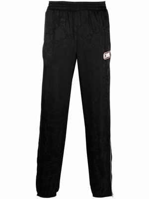 COOL T.M pantalon de jogging à imprimé chaîne - Noir
