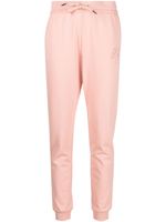 Armani Exchange pantalon de jogging à logo strassé - Rose