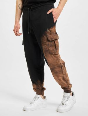 Karl Kani / joggingbroek Signature Bleached in zwart Karl Kani / joggingbroek Signature Bleached in zwart