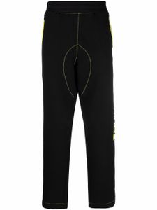 Moschino pantalon de jogging à logo imprimé - Noir