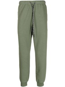 AAPE BY *A BATHING APE® pantalon de jogging à patch logo - Vert