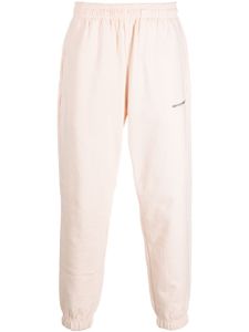 MONOCHROME logo-print cotton track pants - Tons neutres