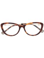 Carolina Herrera lunettes de vue à monture papillon - Marron