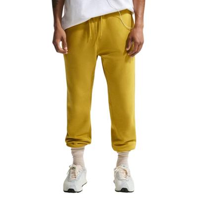 Nike Sportswear Club Fleece Joggingbroek Donkergeel Wit
