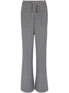 Balmain pantalon ample à motif monogrammé - Blanc