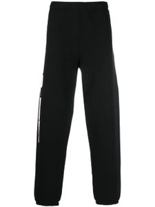 Heron Preston pantalon de jogging à logo imprimé - Noir