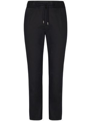 Dolce & Gabbana pantalon de jogging à patch logo - Noir