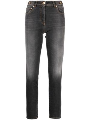 Versace jean skinny à effet délavé - Gris