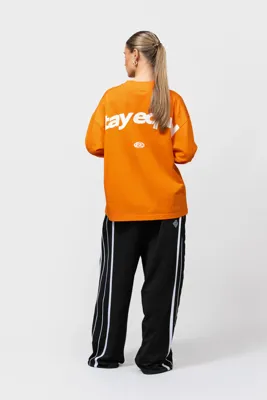 Equalité Stay Equal Longsleeve Dames Oranje PRE-ORDER Begin April - Maat S - Kleur: Oranje | Soccerfanshop