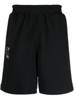 izzue short de sport à logo imprimé - Noir