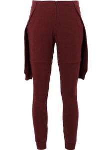 Aganovich pantalon de jogging à empiècements superposés - Rouge