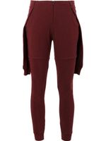 Aganovich pantalon de jogging à empiècements superposés - Rouge