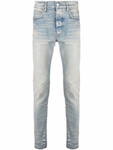 AMIRI jean skinny à patch logo - Bleu