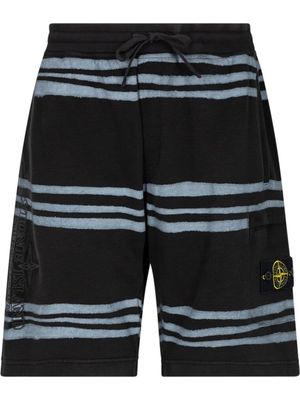 Supreme x Stone Island short à rayures - Noir