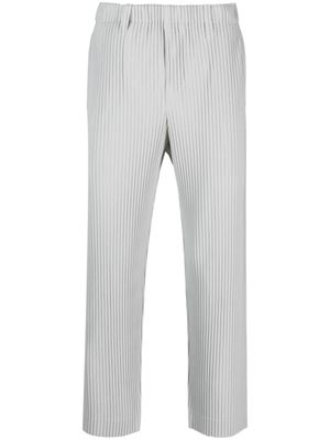 Homme Plissé Issey Miyake pantalon court plissé à taille basse - Gris
