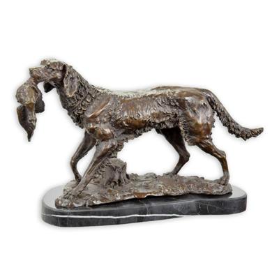 A BRONZE SCULPTURE OF A HOUND