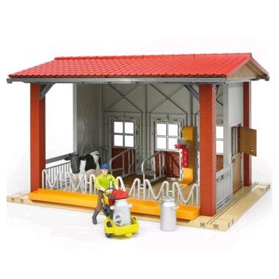 Bruder Koestal met melkmachine