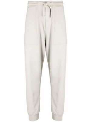 Nanushka pantalon de jogging à logo brodé - Gris
