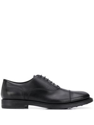 Tod's derbies à logo embossé - Noir
