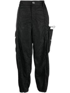 Versace pantalon coupe droite en mesh floral - Noir