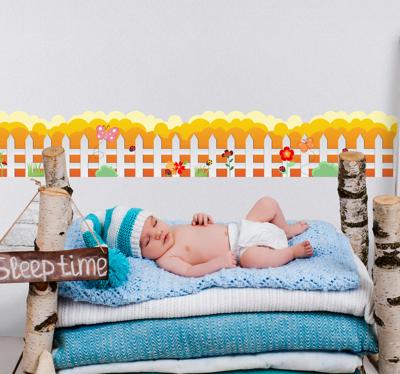 Muursticker sierrand hek met bloemen Muursticker sierrand hek met bloemen