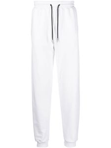 Roberto Cavalli pantalon de jogging à logo imprimé - Blanc