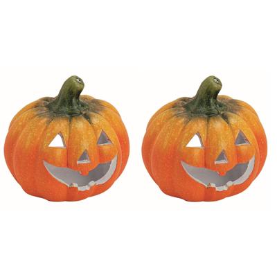 Halloween pompoen theelichthouder - Set van 4x stuks - klei - oranje - 14 x 13 cm - windlichten