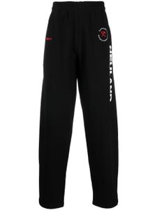 GmbH pantalon de jogging en coton biologique à logo imprimé - Noir