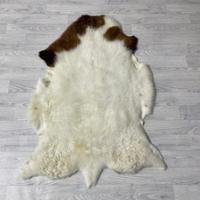 Schapenvacht bruin wit 125x90cm XL