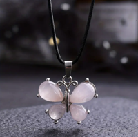 Rozenkwarts vlinder ketting - Sieraden - Spiritueelboek.nl