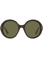 Gucci Eyewear lunettes de soleil rondes à effet écailles de tortue - Marron