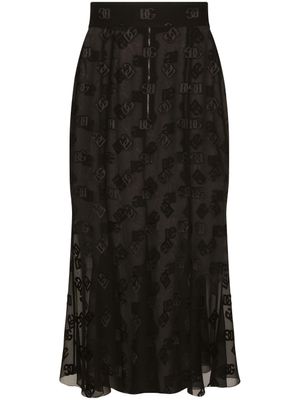 Dolce & Gabbana jupe mi-longue satinée à logo DG - Noir