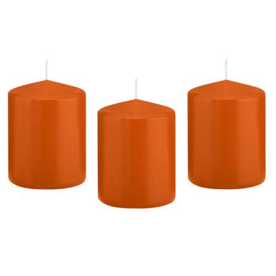 Trend Candles cilinder kaarsen - 10x - stompkaarsen - oranje - 6 x 8 cm - 29 branduren