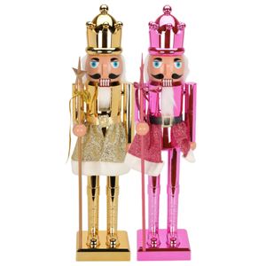 Notenkraker decoratie figuur beelden - set 2x st - 60 cm - goud en roze - kunststof