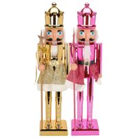 Notenkraker decoratie figuur beelden - set 2x st - 60 cm - goud en roze - kunststof