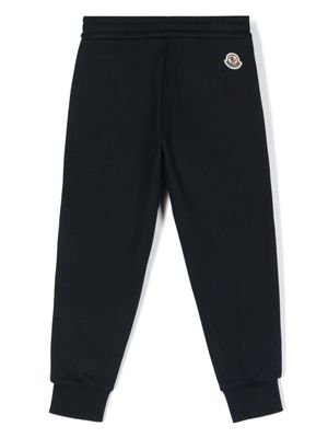 Moncler Enfant pantalon de jogging à rayures - Bleu