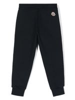 Moncler Enfant pantalon de jogging à rayures - Bleu