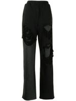 Goen.J pantalon ample à effet usé - Noir