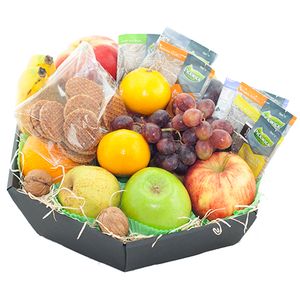 Fruitmand seizoensfruit, thee en koek