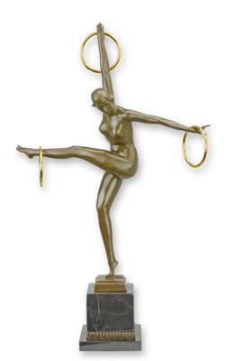A BRONZE SCULPTURE OF THE DANCER OF THE RINGS