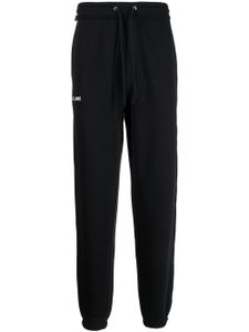 Helmut Lang pantalon de jogging à logo imprimé - Noir