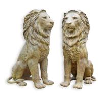 A BRONZE SCULPTURE OF A SITTING LION