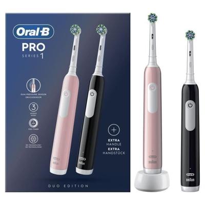 Oral-B Pro Series 1 set van twee, roze en zwarte elektrische tandenborstels, 2 opzetborstels, ontworpen door Braun Oral-B Pro Series 1 set van twee, roze en zwarte elektrische tandenborstels, 2 opzetborstels, ontworpen door Braun